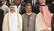Minister of Energy and Industry and Opec President H E Mohammed bin Saleh Al Sada with Opec Secretary General Mohammed Sanusi Barkindo (centre) and Saudi Energy Minister Khalid Al Falih at the 15th International Energy Forum Ministerial (IEF15) in Algiers