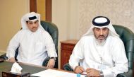 Abdul Hadi Ahen Ali Ahen (right) and QCB official Hassan Mohannadi addressing the media yesterday.Pic: Abdul Basit / The Peninsula