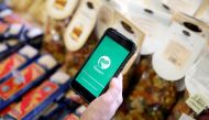 Natalia Shagarina, inventor of Edadeal mobile phone application tracking down discount deals in supermarkets, demonstrates the application at a cafe in Moscow, Russia, October 4, 2016. REUTERS/Maxim Zmeyev
