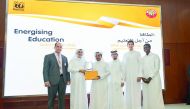 Energising Education’ competition winners awarded by RasGas representatives and the Ministry of Education and Higher Education for their projects on helium.