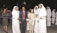 US Ambassador, Dana Shell Smith (centre) cutting a ceremonial ribbon to mark the opening of the Almana Motors Company’s New Ford and Lincoln Showroom at Airport Road in the presence of Bader Almana, (left)Managing Director of Almana Motors, Kalyana Sivagn