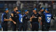 New Zealand's captain Kane Williamson (C) and teammates celebrate their victory over India after the second One Day International (ODI) cricket match between India and New Zealand at the Ferozshah Kotla ground in New Delhi on October 20, 2016. (AFP / Prak