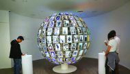 People visit the new Google pop-up shop in the SoHo neighbourhood in New York City, yesterday. The shop lets people try out new Google products such as the Pixel phone, Google Home, and Daydream VR. The products will be available for purchase offsite at V