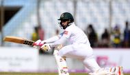 Bangladesh captain Mushfiqur Rahim plays a shot during the fourth day of the first Test match between Bangladesh and England at Zahur Ahmed Chowdhury Cricket Stadium in Chittagong on October 23, 2016. (AFP / Dibyangshu SARKAR)