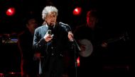 Singer Bob Dylan performs during a segment honoring Director Martin Scorsese, recipient of the Music+ Film Award, at the 17th Annual Critics' Choice Movie Awards in Los Angeles January 12, 2012. Reuters/Mario Anzuoni/File Photo