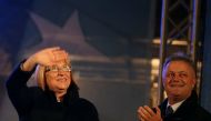 Tsetska Tsacheva (L), presidential candidate of the Bulgaria's ruling centre-right GERB party, waves next to vice-presidential candidate Plamen Manushev during an election rally in Plovdiv, Bulgaria November 4, 2016. Reuters/Stoyan Nenov