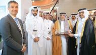 Minister of Energy and Industry H E Dr Mohammed bin Saleh Al Sada, with the Nakilat officials during 'Made in Qatar' exhibition, in Riyadh. 