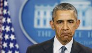 Barack Obama reacts to a question while delivering remarks on the economy in the White House press briefing room in Washington April 5, 2016. (REUTERS / Gary Cameron) 