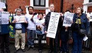 Human rights campaigner Peter Tatchell and other Assange supporters outside the Embassy of Ecuador as Swedish prosecutors question Wikileaks founder Julian Assange on November 14, 2016 in London, United Kingdom. Mr Assange has been inside the embassy sinc
