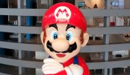 (FILES) A file picture taken on September 8, 2016 shows the logo of Japanese gaming giant Nintendo and its game character Super Mario being displayed at a showroom in Tokyo.  AFP / KAZUHIRO NOGI
