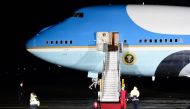 The red carpet is rolled out as US President Barack Obama arrives in Air Force One on November 16, 2016 at Berlin's Tegel airport.  AFP / TOBIAS SCHWARZ
