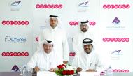 Sheikh Nasser Bin Hamad Bin Nasser Al-Thani (standing left) and Waleed Al Sayed (standing right) at the signing ceremony, yesterday.