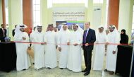 H E Dr Mohammed bin Saleh Al Sada, Minister of Energy and Industry; and other officials cutting the ribbon marking the opening of  the Exhibiton of the 5th International Gas Processing Symposium, yesterday. Pic: Baher Amin/The Peninsula