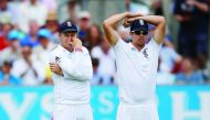 England’s Joe Root and Alastair Cook (right) look dejected after a missed chance during the fourth Test match against Pakistan at the Oval in at Edgbaston in this August 13 file photo.