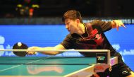 Ma Long of China in action against South Korea's Jeoung Youngsik during the ITTF World Tour Grand Finals at Ali Bin Hamad Al Attiyah Arena in Doha yesterday. Ma Long won 11-9, 11-8, 11-8, 14-12.
Pictures by: Abdul Basit / The Peninsula