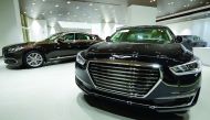 Cars of Hyundai and its luxury brand Genesis displayed at Skyline Automotive's showroom located along the B-Ring Road.