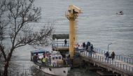  Rescuers unload fragments and remains from a boat, found at the site of the Tu-154 plane crash near Sochi, Russia, 25 December 2016. A Tu-154 aircraft of the Russian Defense Ministry has crashed in the Black Sea after it disappeared from radar, regional 