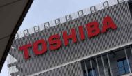 The logo of Japanese conglomerate Toshiba is seen on a wall of a building in Kawasaki, suburban Tokyo, on December 29, 2016.  AFP / TORU YAMANAKA
