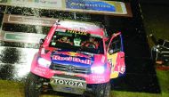 Qatari driver Nasser Saleh Al Attiyah and co-driver  Matthieu Baumel drive their Toyota during the symbolic start from the podium during the departure ceremony of Dakar Rally 2017 in Asuncion, Paraguay yesterday.