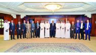 Abdulbasit Ahmed Al Shaibei CEO of QIIB, and top executives of the bank with Aala Ismail, Chairman of Banking Services for Major Companies,  at an event held to honour Aala to mark the end of his services.