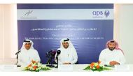 Abdulaziz bin Nasser Al Khalifa (centre),  Khalifa Essa Al Khulaifi (left) and  Ibrahim Abdulaziz Al Mannai, Executive Director, Advisory Services, QDB during a press  conference, yesterday.
