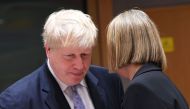 British foreign minister Boris Johnson (L) listens to EU foreign policy chief Federica Mogherini during an EU foreign ministers meeting at the European Council, in Brussels, on January 16, 2017. AFP / EMMANUEL DUNAND