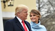 US President-elect Donald Trump and his wife Melania leave St. John's Episcopal Church on January 20, 2017, before Trump's inauguration. / AFP / Nicholas Kamm