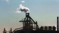Chimneys of a steel factory at an industrial area in Kawasaki, Japan, yesterday. 
