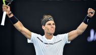 Spain's Rafael Nadal celebrates after victory against Germany's Alexander Zverev during their men's singles third round match on day six of the Australian Open tennis tournament in Melbourne on January 21, 2017. AFP / PETER PARKS
