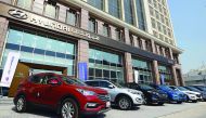Skyline Automotive's 2017 model cars in the outdoor of B-Ring Road Showroom - Hyundai in Doha. (Right) vehicles showcased inside the show room.