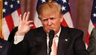 President-elect Donald Trump has threatened to tear up or renegotiate international free trade agreements in order to protect US jobs (AFP Photo/Rhona Wise ).