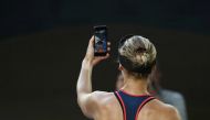 Croatia's Mirjana Lucic-Baroni takes a selfie photo after losing her Women's singles semi-final match against Serena Williams of the US. (REUTERS/Issei Kato)