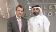 Matthew Mee (left), Middle East Managing Director, CIPD, and Haddal Al Dosari, Director, Human Resources, the QFC Regulatory Authority, at a workshop for the Human Resources team at the Regulatory Authority.