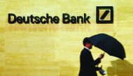  A man walks past Deutsche Bank offices in London.