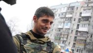 (FILES) This file photo taken on October 16, 2014 shows Givi, commander of the pro-Russian separatist Somali battalion, speaking to reporters from their lookout centre near Donetsk's Sergey Prokofiev international airport.  AFP / Dominique FAGET
