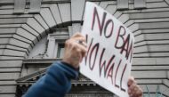Opponents of U.S. President Donald Trump's executive order imposing a temporary immigration ban on seven Muslim-majority nations protest outside a federal appeals court February 7, 2016 in San Francisco, California. Elijah Nouvelage/AFP
