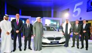 Hussain Ibrahim Alfardan (third right) Chairman AlFardan Group,  Omar Hussain Alfardan, President and CEO of AlFardan group (fourth left) with other officials and guests on the launch of BMW 5 Series at BMW Alfardan showroom in West Bay. Pic: Abdul Basit/
