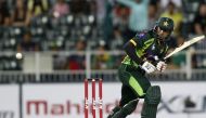 Pakistan's Nasir Jamshed plays South Africa's Lonwabo Tsotsobe's delivery during their first Twenty20 cricket match in Johannesburg November 20, 2013. (REUTERS/Siphiwe Sibeko)