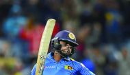 Sri Lankan batsman Asela Gunaratne celebrates after scoring the winning run during the second Twenty20 cricket match against Australia at Kardinia Park in Geelong yesterday.