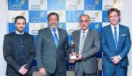 Gulf Air officials with the award. 