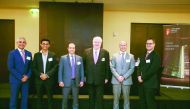 Panellists of the roundtable discussion on raising capital in the GCC pose for a group picture at the JW Marriott Marquis Hotel in Dubai. 