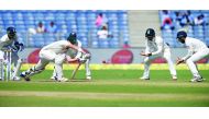 India's Wriddhiman Saha (left), Ajinkya Rahane (third left),  Murali Vijay (second right) and captain Virat Kohli (right) watch  as Australia's Matthew Renshaw plays a defensive shot during the first day of their first Test at the Maharashtra Cricket Asso