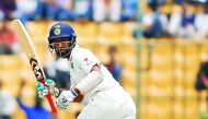 India's Cheteshwar Pujara plays a shot on third day of second Test against Australia at M Chinnaswamy Stadium in Bangalore India yesterday. 