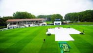 The covers lay over the wicket on final day of the first Test between New Zealand and South Africa in Dunedin yesterday. 