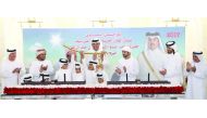Emir H H Sheikh Tamim bin Hamad Al Thani awards the Sword of H H the Emir to the winners of the annual festival of Arabian Thoroughbred Camel Race, held at Al Shahania camel racetrack yesterday.