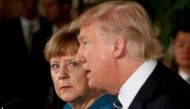 Germany's Chancellor Angela Merkel and U.S. President Donald Trump hold a joint news conference in the East Room of the White House in Washington, U.S., March 17, 2017. REUTERS/Jonathan Ernst 
