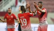 Players of Lekhwiya celebrate during their Qatar Stars League match against El Jaish on Sunday.