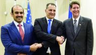 Saad Sherida Al Kaabi (left) President and CEO of Qatar Petroleum and other officials at the signing ceremony.