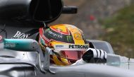 Mercedes' British driver Lewis Hamilton takes a corner during a practice session for the Formula One Chinese Grand Prix in Shanghai on April 8, 2017. / AFP / GREG BAKER

