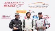 The podium winners at the Qatar Touring Car Championship (QTCC) pose for a picture at the Losail International Circuit. Abdulla Al Khelaifi won the first place, followed by Mahmoud Al Khalaf in the second spot, while Omran Karama came third.